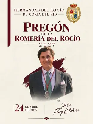 Hombre sonriente con traje oscuro, camisa a rayas y corbata verde, lleva medalla colgada y aparece en cartel del pregón de la Romería del Rocío 2027
